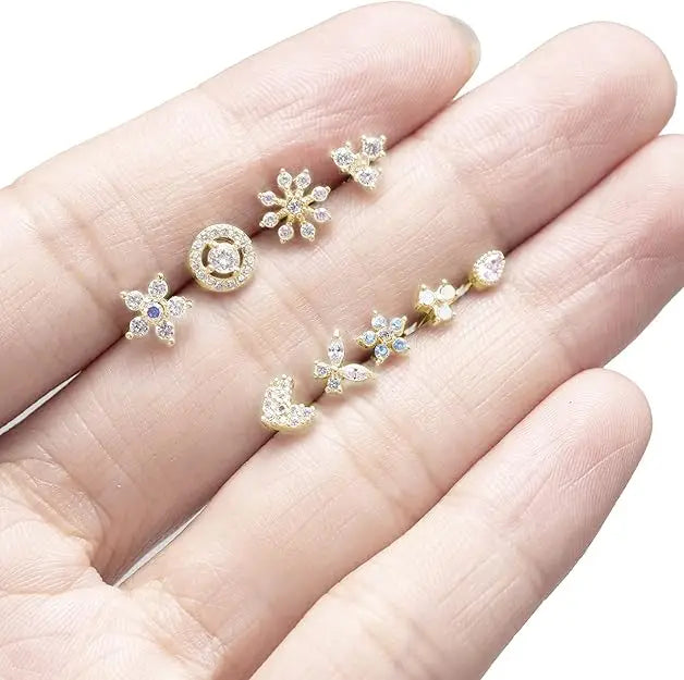 💕 Set de 9 Piercings para Nariz Dorados – Brilla a Tu Manera ✨